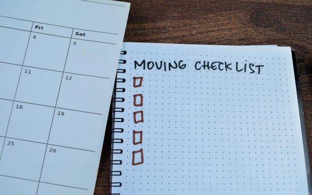 Moving Checklist write on book